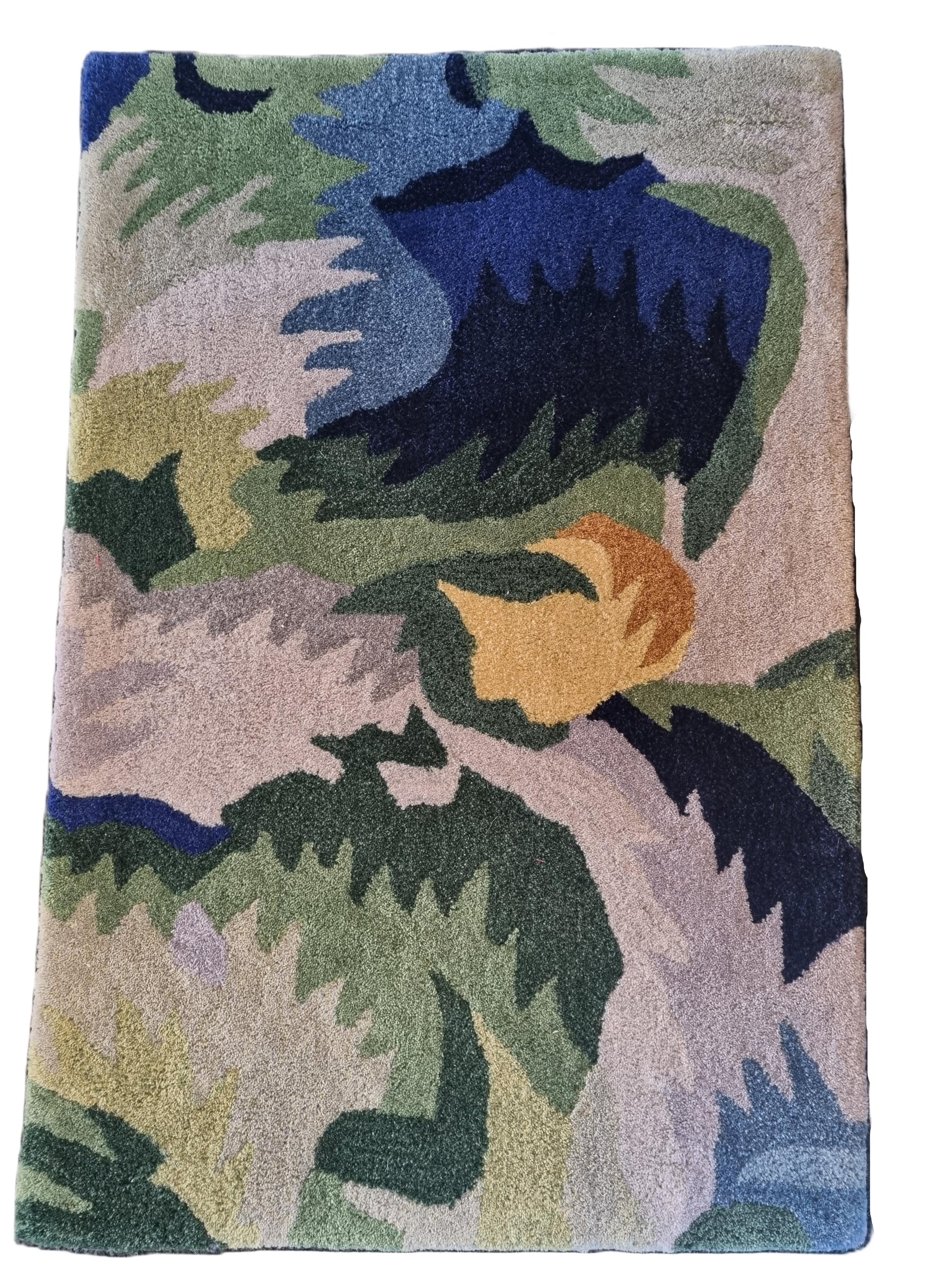 Floral patterned rug with a bird design on a plain background