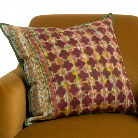 Lattice Band cushion on mustard yellow chair close-up